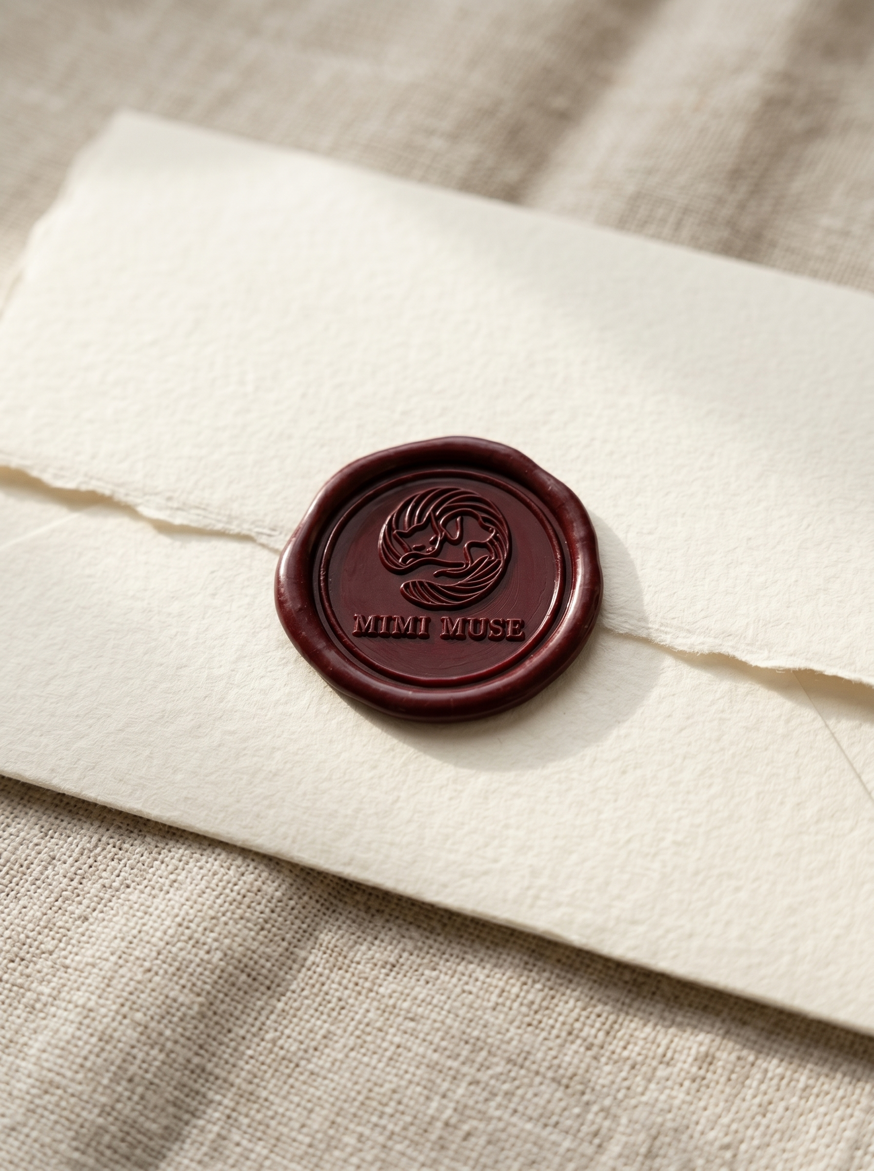 Mimi Muse wax seal on handmade envelope, bespoke packaging for custom needle felted pet portrait orders